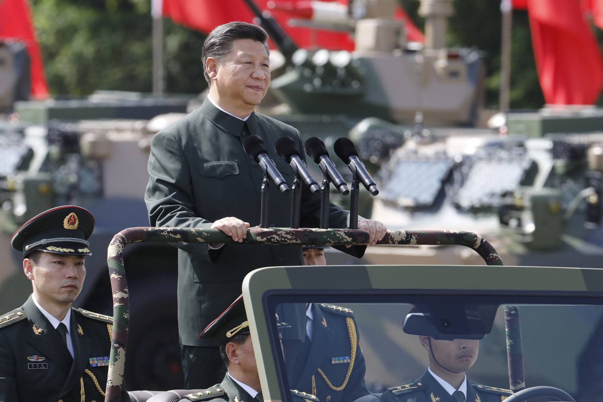 Chinese President Xi Jinping has vowed that by 2049, China would “become a global leader in terms of composite national strength and international influence.” | BLOOMBERG