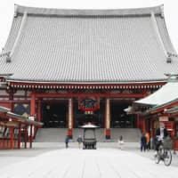 Fewer people than usual are seen at Tokyo\'s Senso-ji Temple on Thursday, as a coronavirus state of emergency remained in place in the capital.  | KYODO