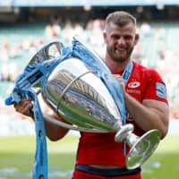 Saracens\' George Kruis celebrates after winning the Premiership title on June 1, 2019, in London. | REUTERS