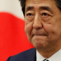 Prime Minister Shinzo Abe holds a news conference on Monday about the end to the nation\'s state of emergency.  | REUTERS 