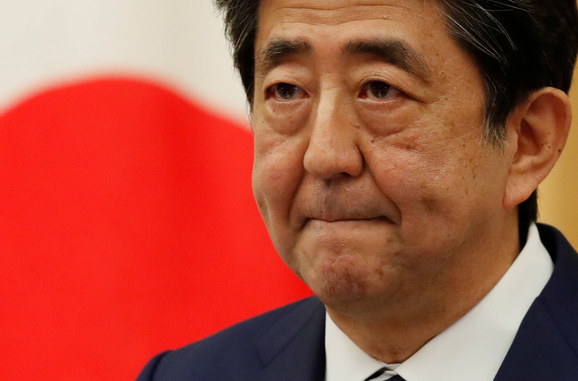 Prime Minister Shinzo Abe holds a news conference on Monday about the end to the nation's state of emergency.  | REUTERS 