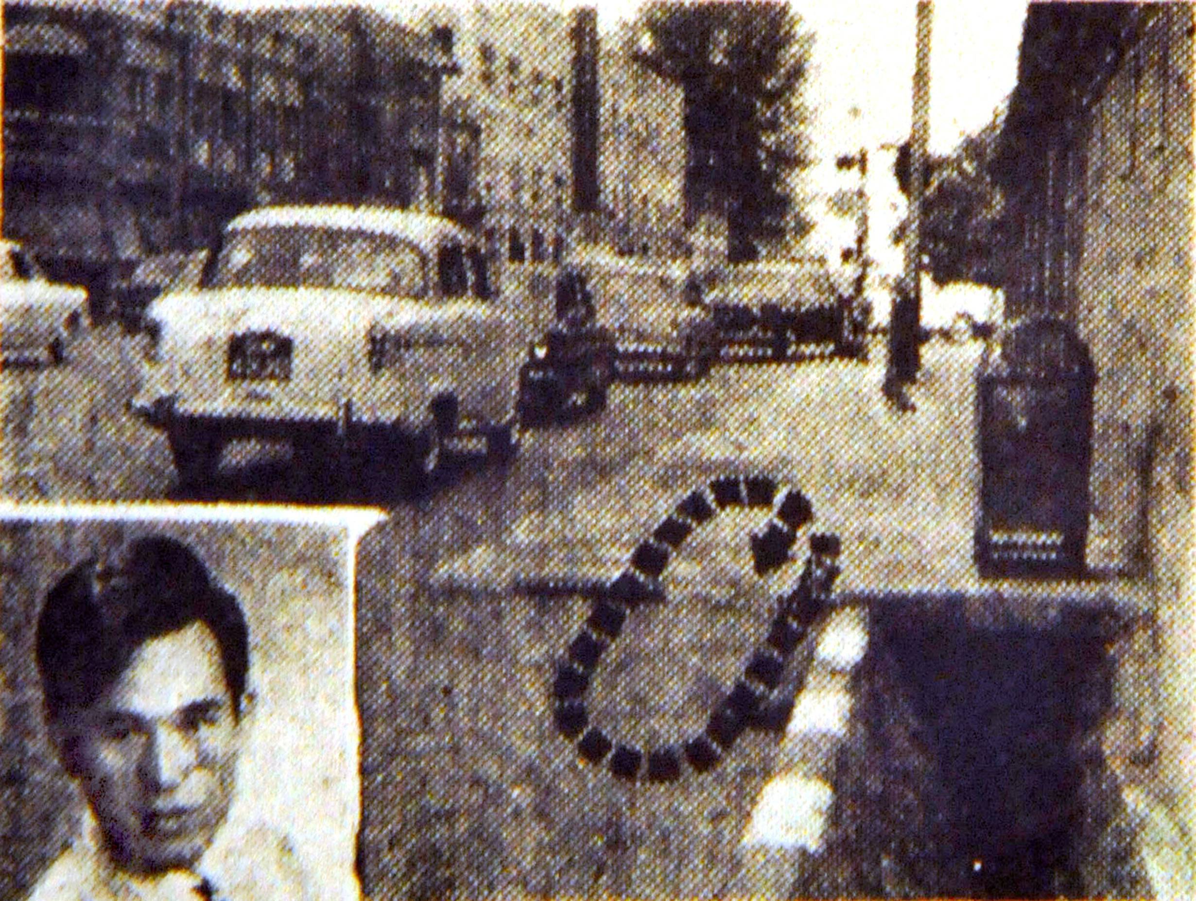 A newspaper clipping shows the area near the junction of Singapore's Bras Basah and North Bridge Road, where an attack on Oct. 24, 1969 led to the injury of nightclub singer Lim Kai Ho and the death of Lam Cheng Siew (unseen). Roland Tan Tong Meng was wanted for the murder. | SINGAPORE PRESS HOLDINGS / SHIN MIN DAILY NEWS / VIA REUTERS  