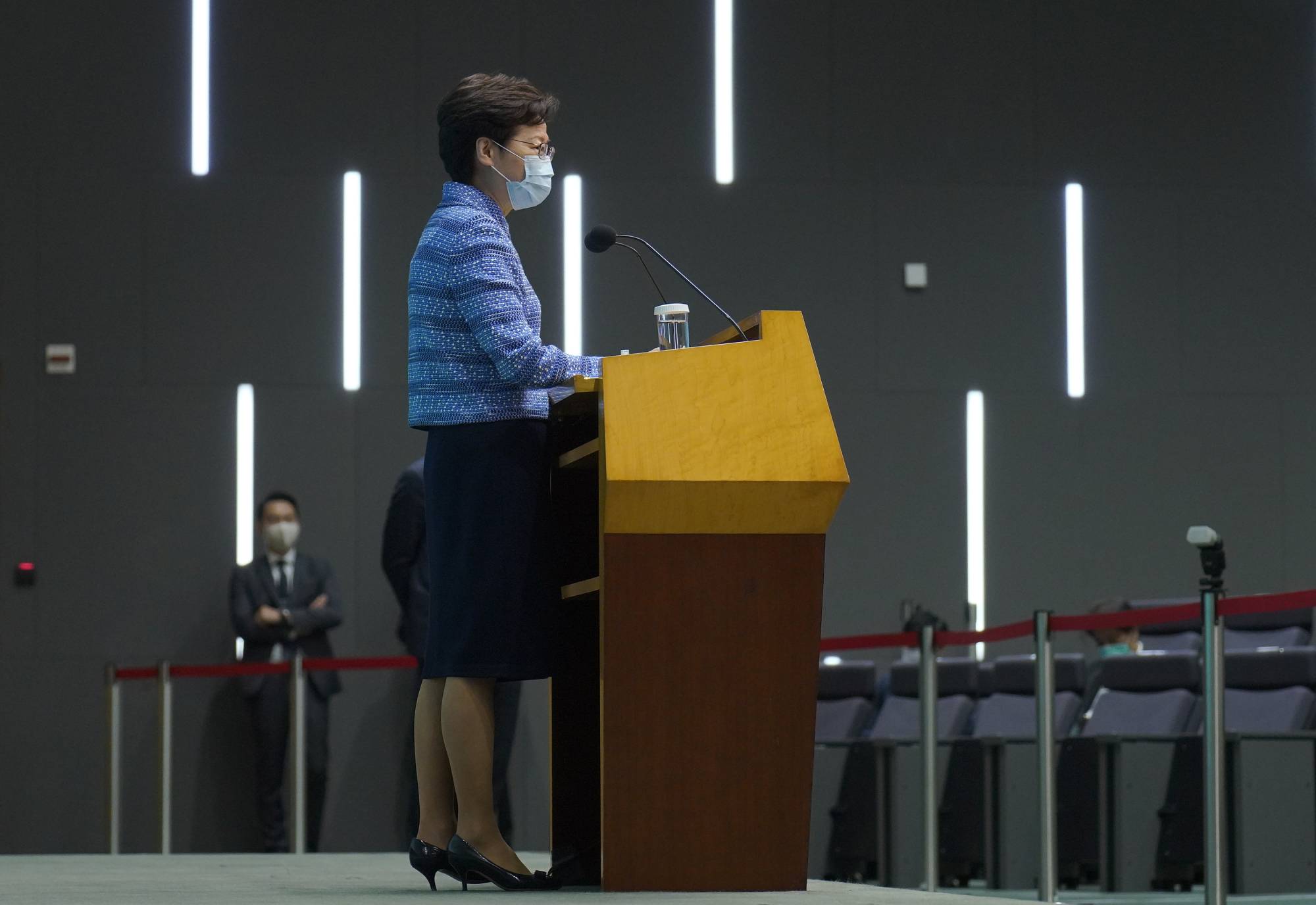 Hong Kong Chief Executive Carrie Lam listens to reporters' questions during a news conference in Hong Kong on Tuesday. | AP