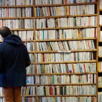 Interest in reading books has risen as people spend more time at home. | AFP-JIJI