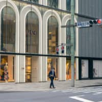 Glitzy Ginza is home to flagship stores of many high-end fashion labels. Those shops were closed by the state of emergency and the streets around them emptied. | OSCAR BOYD