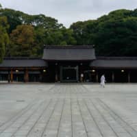 A lone monk walks through the central courtyard of Meiji Jingu, one of Tokyo’s largest shrines, dedicated to the spirits of the Meiji Emperor and Empress. Located not far from Harajuku, the shrine usually receives 3 million visitors a year. Throughout the state of emergency, it was largely deserted. | OSCAR BOYD