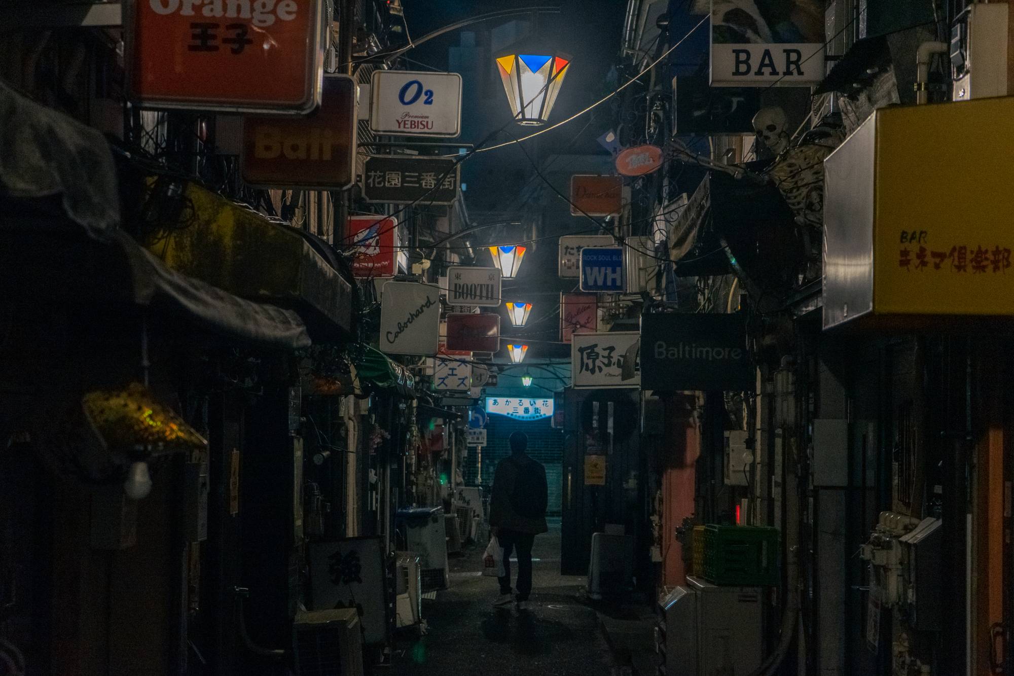 Located to the northeast of Shinjuku Station, Golden Gai is popular with tourists, but its crowded, small and poorly ventilated bars are the stuff of an epidemiologists nightmare. So it was unsurprising to see the bars shut during the state of emergency. The crowds were gone, the bar lights off and only the faint smell of stale alcohol remained. | Oscar Boyd