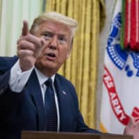 U.S. President Donald Trump speaks before signing an executive order on Thursday.  | THE NEW YORK TIMES / VIA BLOOMBERG