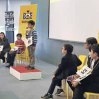 Kshitij Kumar from Kakegawa International Christian School spells a word during the 10th Japan Times Bee on March 10, 2019. | SAYURI DAIMON