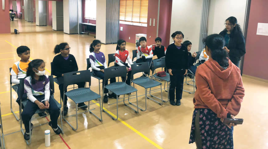 A student of Global Indian International School, Nishi Kasai, spells a word during the school’s bee contest. | GLOBAL INDIAN INTERNATIONAL SCHOOL, NISSY KASAI