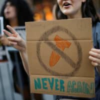 A small group of people protest against the Trump administration\'s nuclear weapons policy in New York in August 2017. | REUTERS