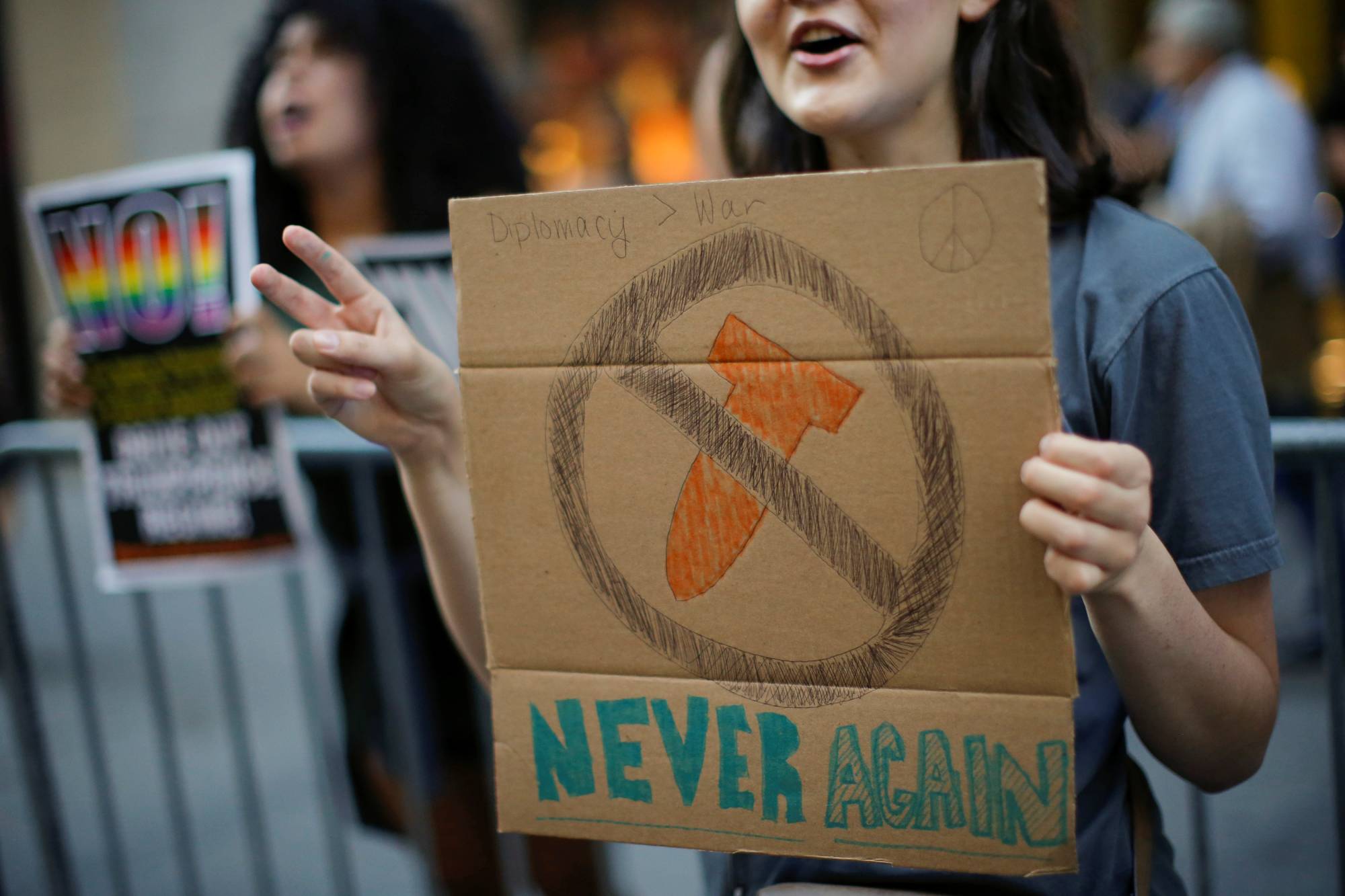 A small group of people protest against the Trump administration's nuclear weapons policy in New York in August 2017. | REUTERS