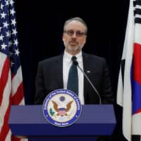 James DeHart, the U.S. State Department\'s senior adviser for security negotiations and agreements bureau of political-military affairs, speaks after a meeting with his South Korean counterpart on the Special Measures Agreement at the U.S. Embassy in Seoul in November. | POOL / VIA REUTERS