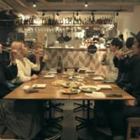 Final farewell: The housemates gather for a fancy dinner where Vivi announces her departure on \"Terrace House Tokyo 2019-2020.\" | © FUJI TELEVISION / EAST ENTERTAINMENT
