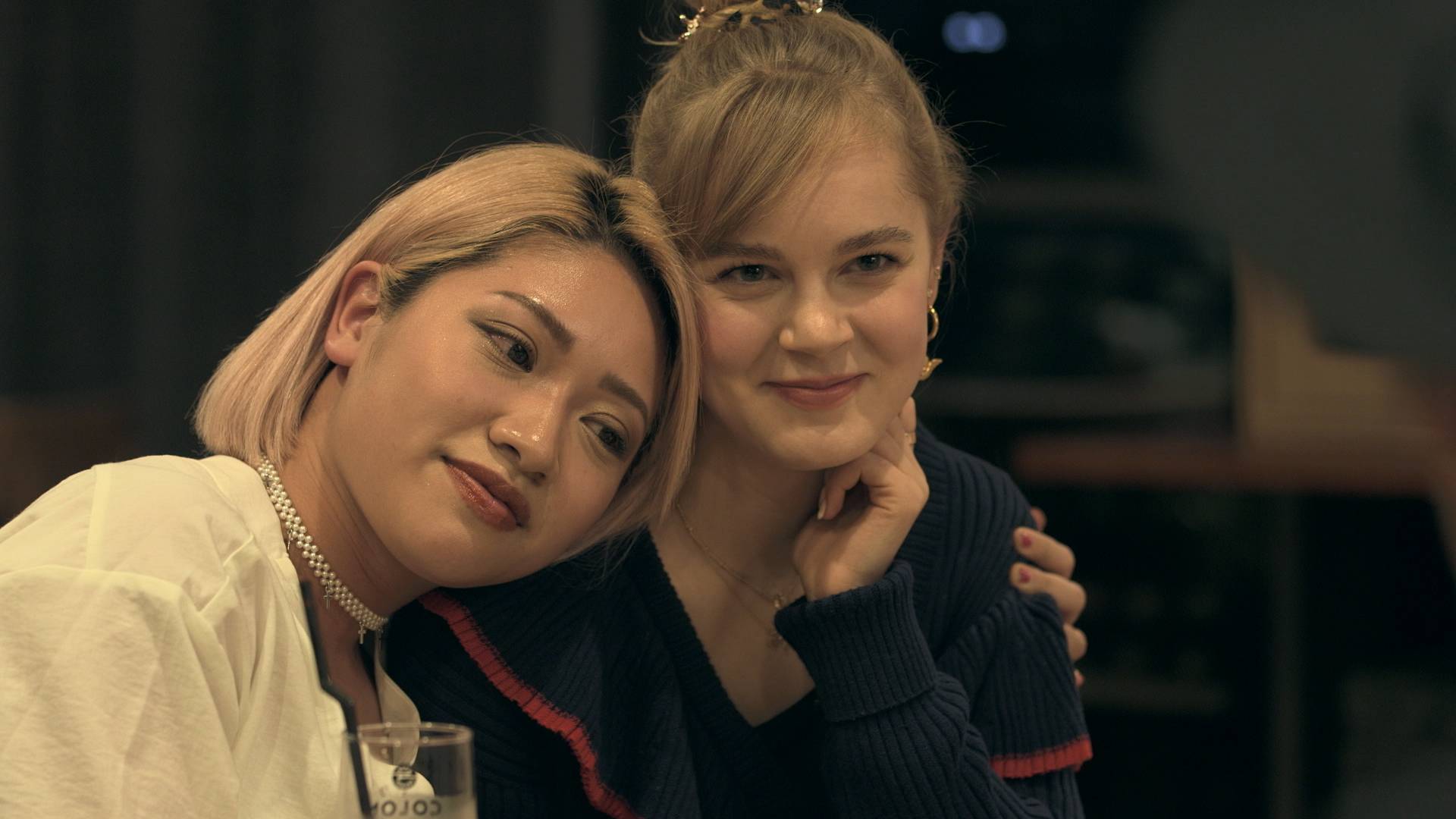 True friends: Hana (left) and Vivi share a sweet moment during Vivi's goodbye party on 'Terrace House Tokyo 2019-2020.' | © FUJI TELEVISION / EAST ENTERTAINMENT 
