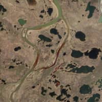 The Copernicus Sentinel-2 mission shows the extent of the oil spill, in red, near a power plant in the Siberian city of Norilsk, Russia. | EUROPEAN SPACE AGENCY / VIA AP