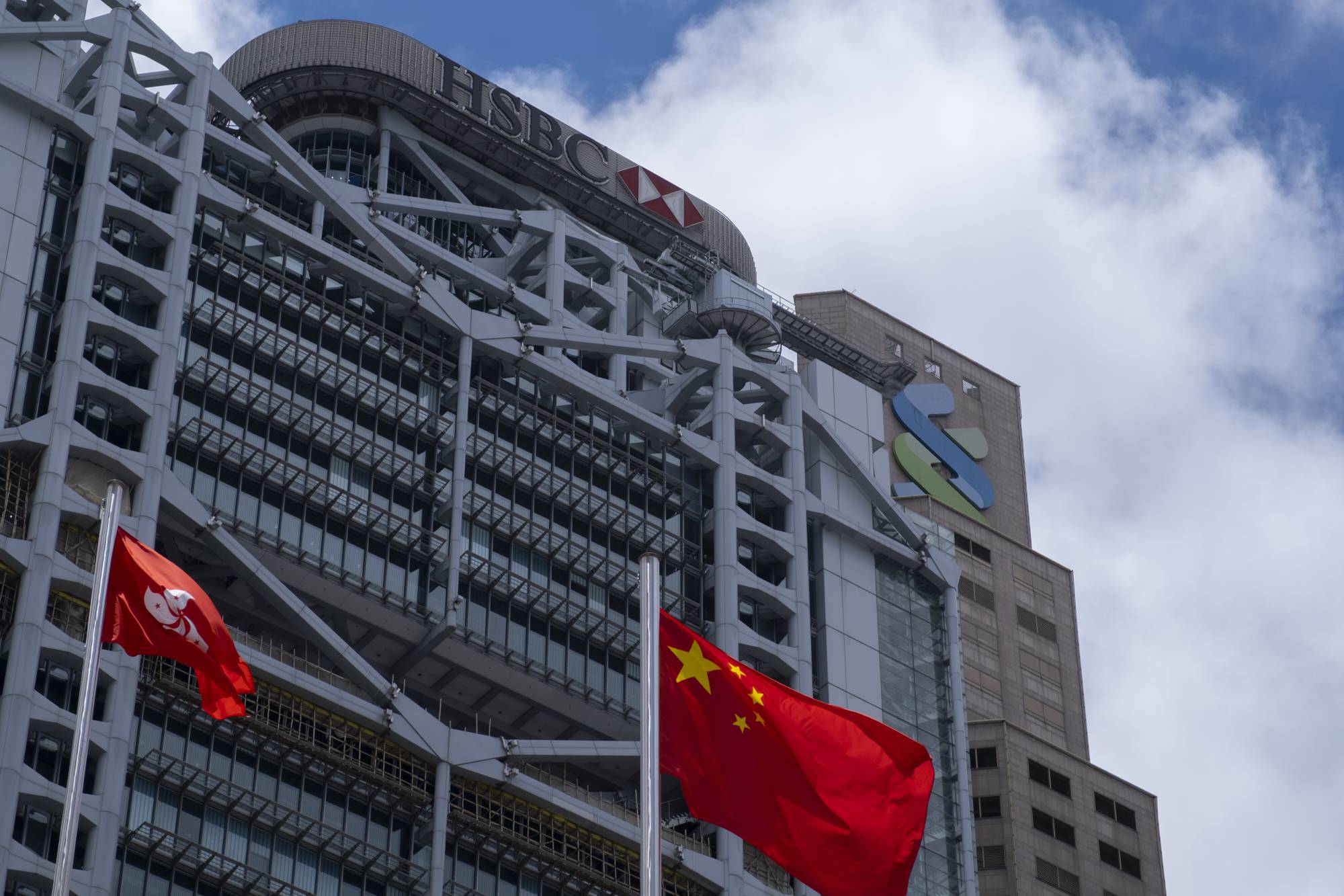 HSBC, one of the two British institutions that dominate Hong Kong's banking system, backed Beijing in the standoff over a proposed new security law, joining Jardine Matheson Holdings Ltd. and some of the city's biggest developers in wading into the political minefield of the former colony's future. | BLOOMBERG