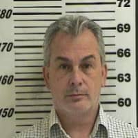Michael Taylor, who was implicated in enabling the dramatic escape of former Nissan Motor Co boss Carlos Ghosn, is seen in a booking photograph from October 24, 2012, when he was detained on unrelated charges. | DAVIS COUNTY SHERRIFF\'S OFFICE / VIA REUTERS