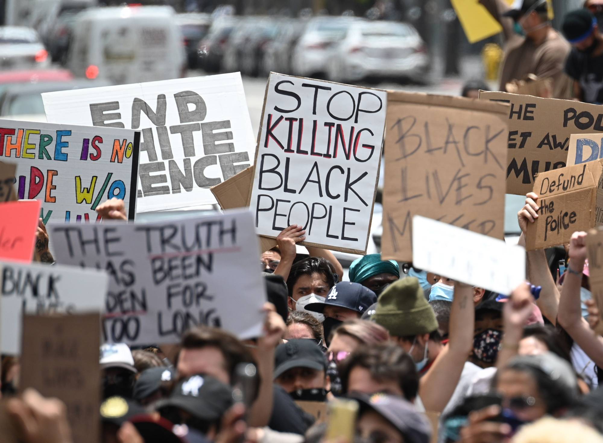 Demonstrators march through the streets of Hollywood, California, on June 2 to protest the death of George Floyd at the hands of police. Two weeks of massive gatherings have raised concerns about a second wave of COVID-19 infections in the U.S. | AFP-JIJI