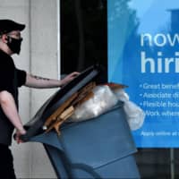 The U.S. economy regained 2.5 million jobs in May as the coronavirus shutdowns began to ease, but the gains appear to largely reflect simple reopening rather than any significant underlying economic strength. | AFP-JIJI