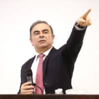 Carlos Ghosn, former chief executive officer of Nissan Motor Co. and Renault SA, chooses a journalist to ask a question as he speaks to the media at the Lebanese Press Syndicate in Beirut in January. 
 | BLOOMBERG