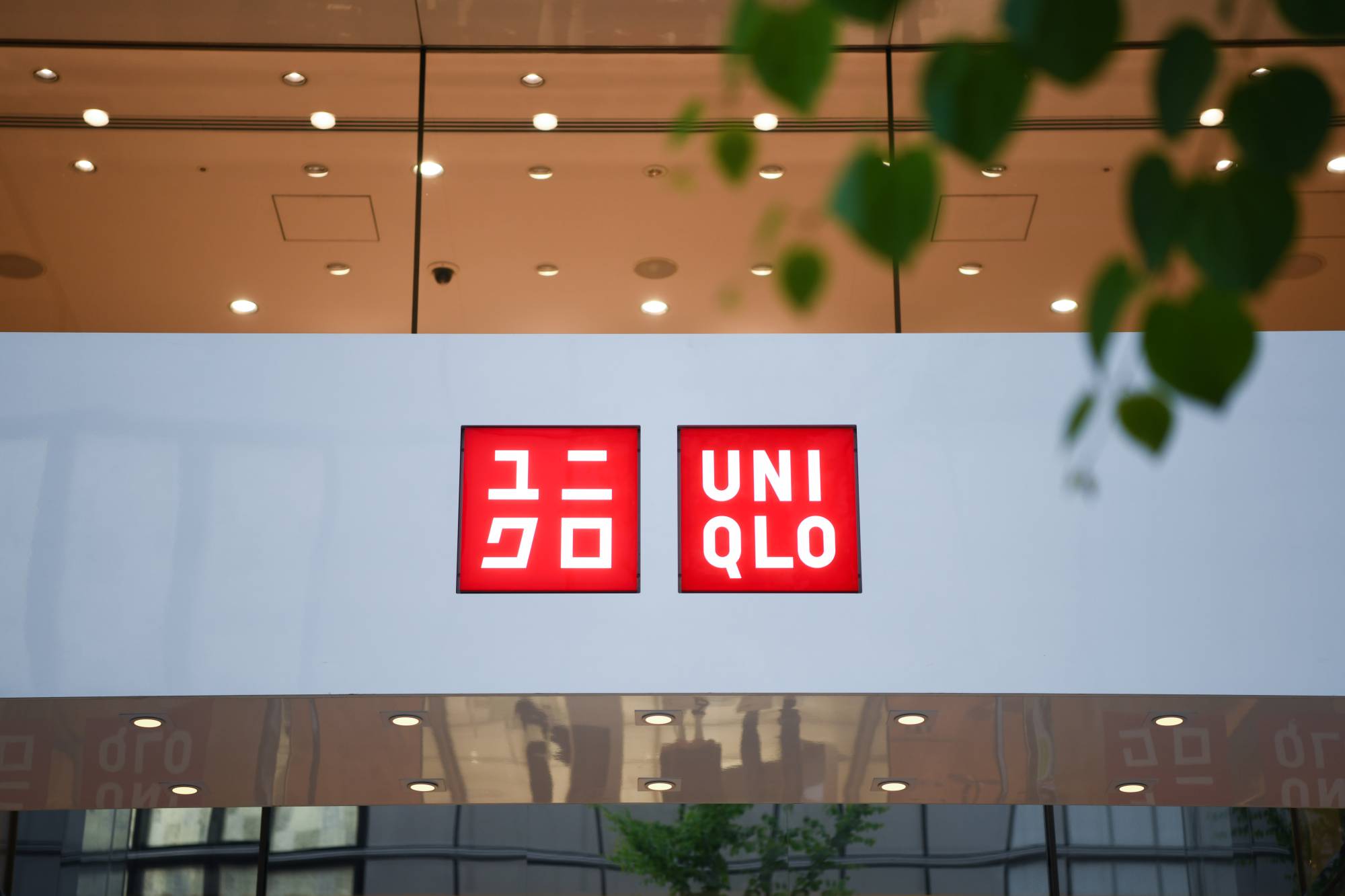 Fast Retailing Co., operator of the Uniqlo clothing stores, will begin selling reusable face masks in Japan this week for ¥990 for a set of three. | BLOOMBERG