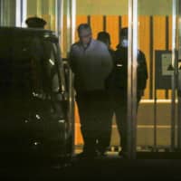 Greg Kelly, former representative director of Nissan Motor Co., leaves the Tokyo Detention House in Tokyo in December 2018.  | BLOOMBERG