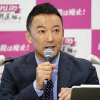 Taro Yamamoto, head of Reiwa Shinsengumi, announces his candidacy for the Tokyo gubernatorial election at the Diet building in the capital on Monday. | KYODO