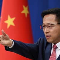 In March, the Chinese foreign ministry’s newly appointed deputy spokesman, Zhao Lijian, promoted a conspiracy theory alleging that the U.S. military brought the new coronavirus to Wuhan. | AFP-JIJI