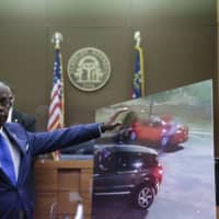 Fulton County District Attorney Paul L. Howard Jr. speaks at a news conference Wednesday in Atlanta. Howard announced former Atlanta police officer Garrett Rolfe faces charges including felony murder in the fatal shooting of Rayshard Brooks last week. | AP