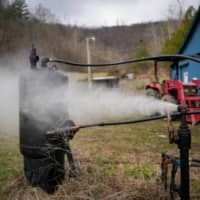 Pressure is released from a natural gas well on the property of Harlen Rowe. | REUTERS 