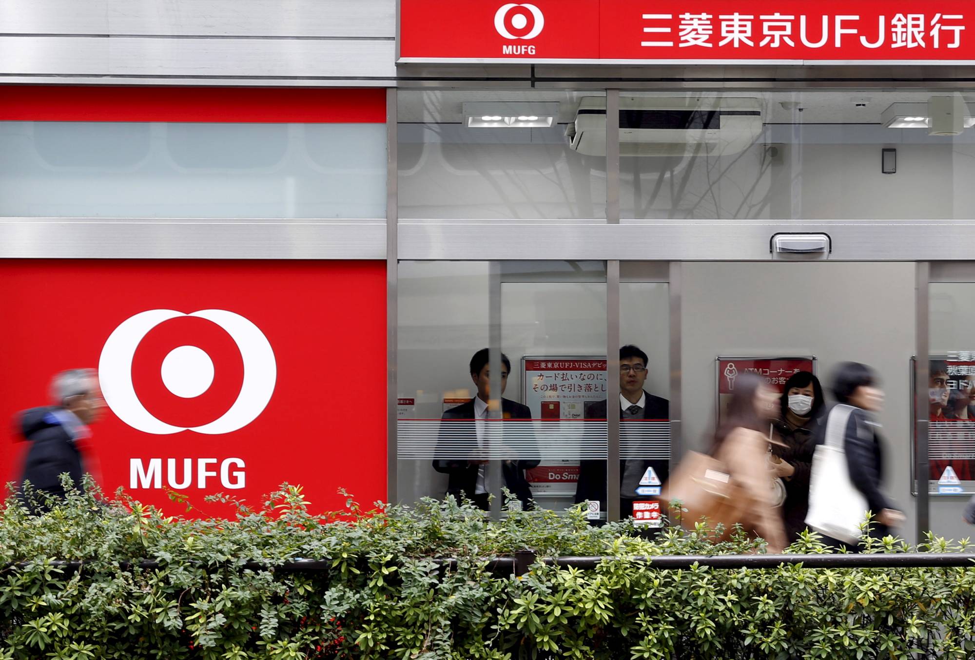 Tokyo-Mitsubishi UFJ and other banks are piling into risky debt to beat their lowly returns on interest rates in Japan. | REUTERS