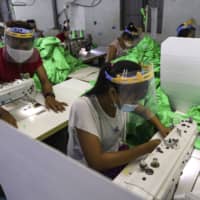 Garment factories have been closed across Southeast Asia as demand plummets amid the coronavirus pandemic. About a third of the 600 garment factories in Cambodia are shut, which has cost tens of thousands of workers their jobs and left them struggling to survive as state aid has been slow to materialize. | AP