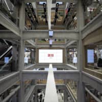 A four-story outlet conceptualized by designer Kashiwa Sato, Uniqlo Tokyo is one of the company\'s largest outlets in the nation. | BLOOMBERG