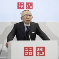 Chairman and chief executive officer of Fast Retailing Co. Tadashi Yanai, sspeaks during a news conference in Tokyo on Thursday. | BLOOMBERG