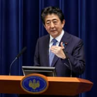Prime Minister Shinzo Abe speaks at a news conference at the Prime Minister\'s Office in Tokyo on Thursday.  | POOL / VIA REUTERS