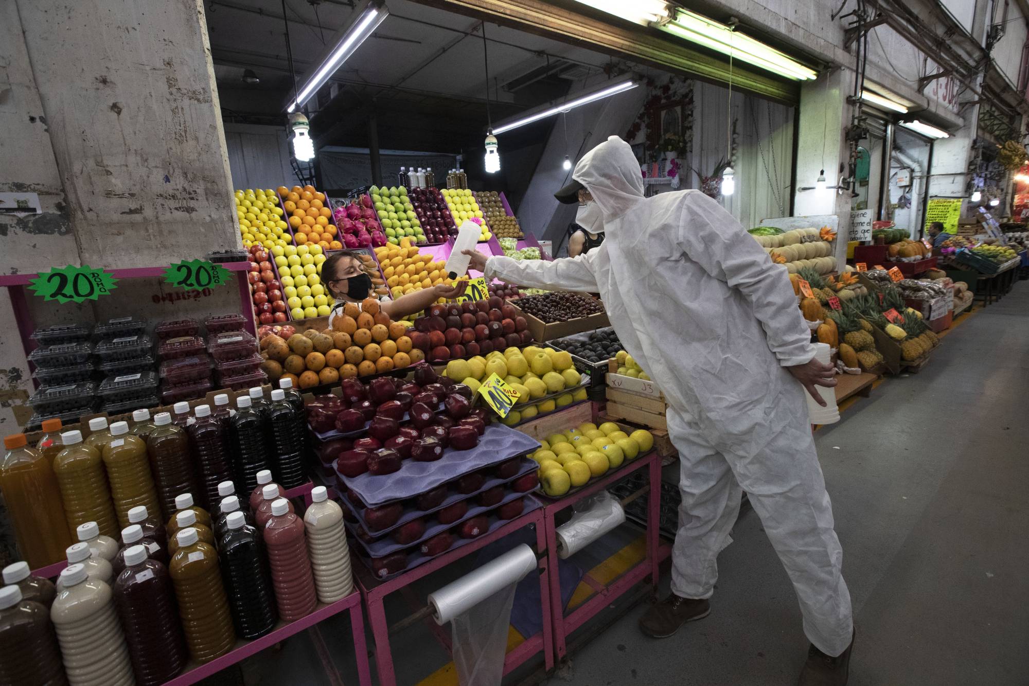 Complicating matters as the world adjusts to a new normal is that the perceived threat from the coronavirus varies from neighborhood to neighborhood, let alone country to country. | AP