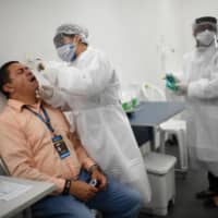 The world\'s biggest economies seem intent on reopening, even if the pace varies. That, in turn, means more social mobility and more opportunities for the virus to spread. | AFP-JIJI