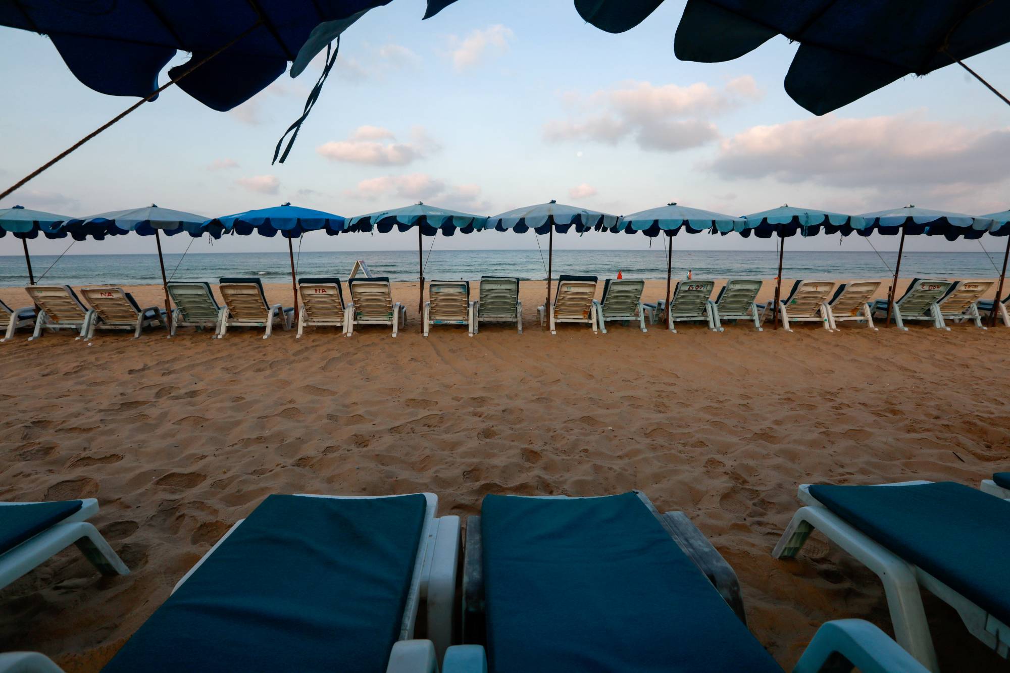 An empty beach in Phuket, Thailand, in March | REUTERS