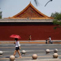 China\'s handling of the virus is again in the spotlight after more than 180 new infections were reported in Beijing over the last week or so, the most in the city since February. | REUTERS