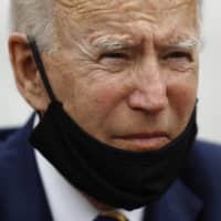 The Democratic presidential candidate, former Vice President Joe Biden, listens as he meets with small-business owners on Wednesday at Carlette\'s Hideaway, a soul food restaurant, in Yeadon, Pennsylvania. |  AP 