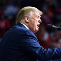 U.S. President Donald Trump speaks during a campaign rally in Tulsa, Oklahoma, on Saturday. | AFP-JIJI