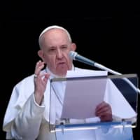 Pope Francis addresses worshipers on Sunday during the weekly Angelus prayer from a window over looking St. Peter\'s square in the Vatican. | AFP-JIJI