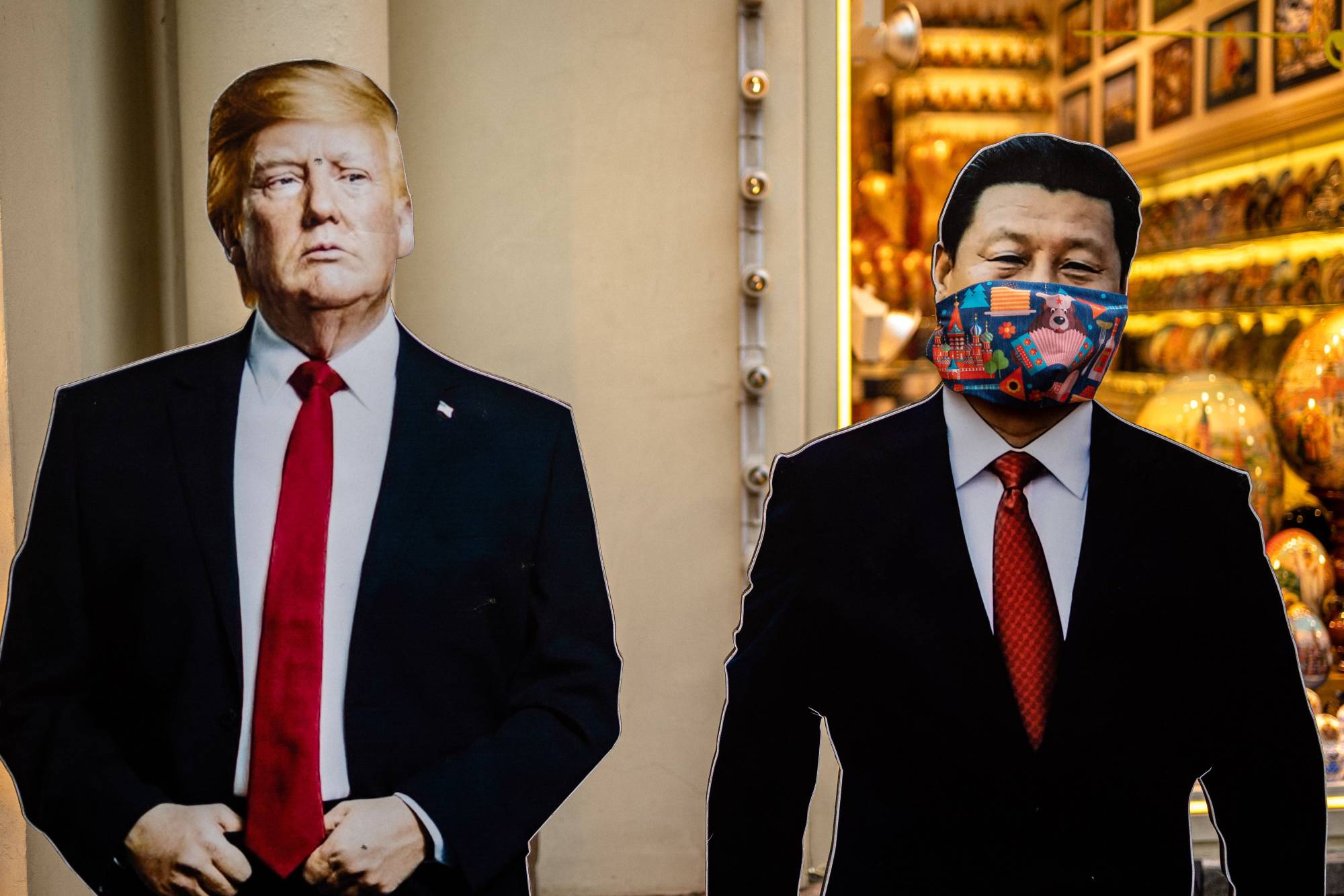 U.S. President Donald Trump and Chinese leader Xi Jinping rarely see eye to eye, but their countries' strong economic ties prevent them from cutting each other off. | AFP-JIJI