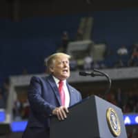 U.S. President Donald Trump speaks during his campaign rally at the BOK Center in Tulsa, Oklahoma, on Saturday. | TULSA WORLD / VIA AP