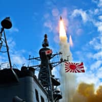 A missile launched from the Maritime Self-Defense Force destroyer Kirishima successfully intercepts a ballistic missile target off the coast of Kauai, Hawaii, in 2010. | U.S. NAVY