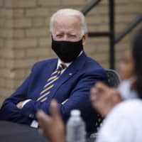 Democratic presidential candidate, former Vice President Joe Biden, listens during a meeting with small business owners in Yeadon, Pennsylvania, on Wednesday. | AP