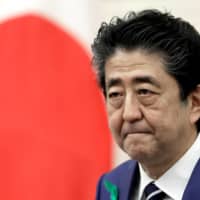 Prime Minister Shinzo Abe may consider a Cabinet reshuffle or a snap election in coming months to boost his public approval rating. | REUTERS