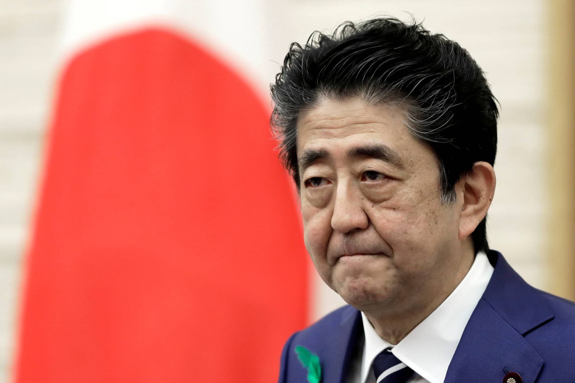 Prime Minister Shinzo Abe may consider a Cabinet reshuffle or a snap election in coming months to boost his public approval rating. | REUTERS