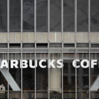 A new Starbucks outlet opening in Japan with sign language ability for hearing impaired customers will be the fifth \"signing store\" globally run by the U.S. coffee chain, as it is stepping up efforts to create stores with a focus on diversity and inclusion. | REUTERS